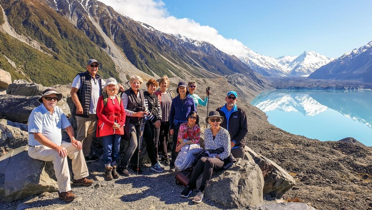 MoaTrek tour group and guide at the Tasman Glacier Lookout in Mt Cook National Park.
